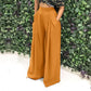 Pantalones elegantes de cintura alta para mujer