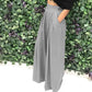 Pantalones elegantes de cintura alta para mujer